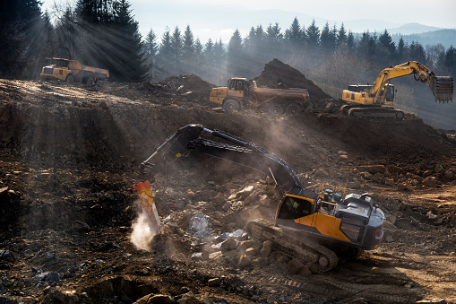 The construction machinery  prepare the ground for the construction of highway S7, Naprawa, Poland