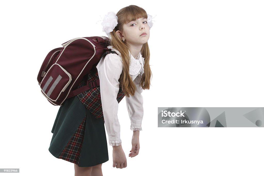 Schoolgirl is tired. Education  Abundance Stock Photo