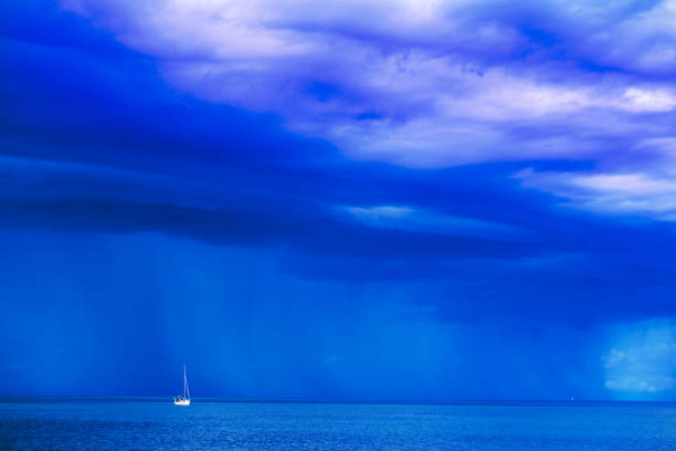istock Sailing boat at stormy sea horizon 918241176