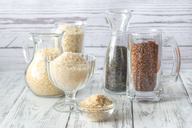 istock Different kinds of rice on the white background 918241316