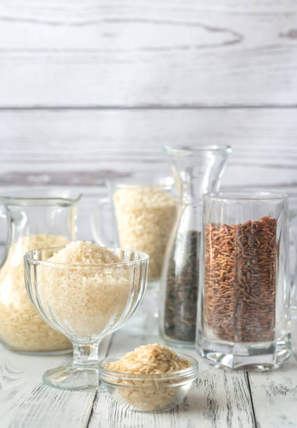 istock Different kinds of rice on the white background 918241516