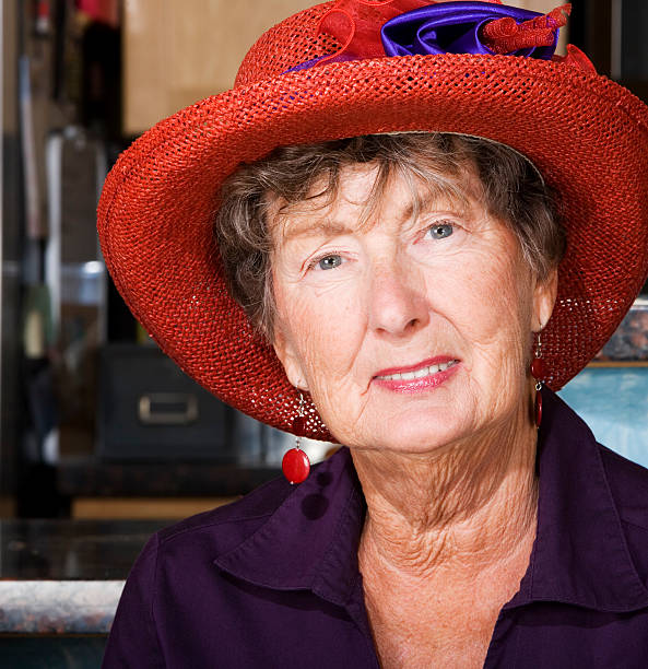 istock Senior Woman Wearing Red Hat 91824208