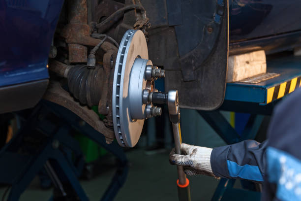 istock Disk brake repair in the car. 918242166