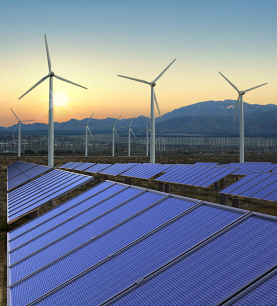 istock Solar panels and wind mills in renewable energy farm 91824450