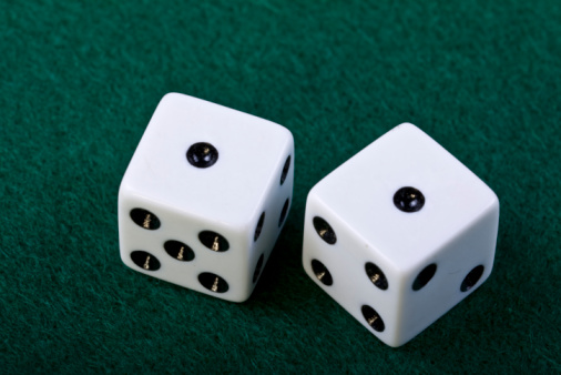 High angle view a dice on gray background with copy space