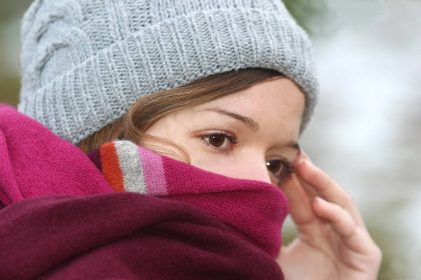 istock young woman on a cold winter day, thoughtful 918247494
