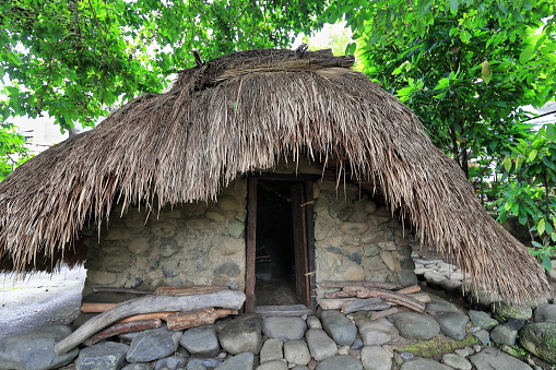 Ulog-communal masonry and thatch sleeping hut for young girls in a traditional ili-tribal village of the Bontoc people of the Igorots. Mountain province-Cordillera region-Luzon island-Philippines.
