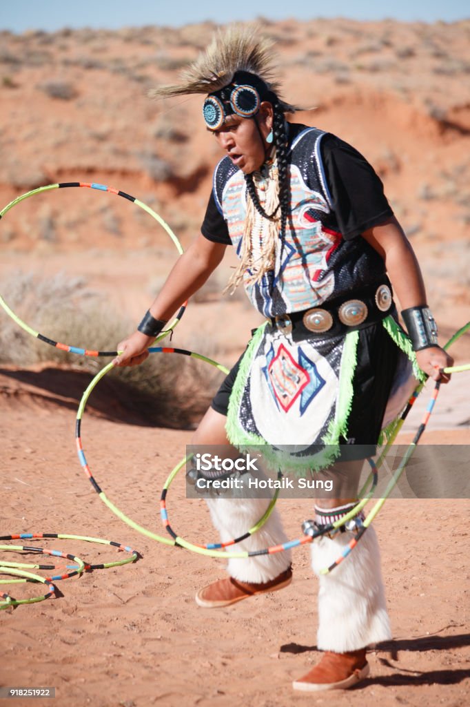 A Navajo Native American Man performing Traditional Dance A Navajo Native American Man performing Traditional Dance (horizontal) Navajo Culture Stock Photo