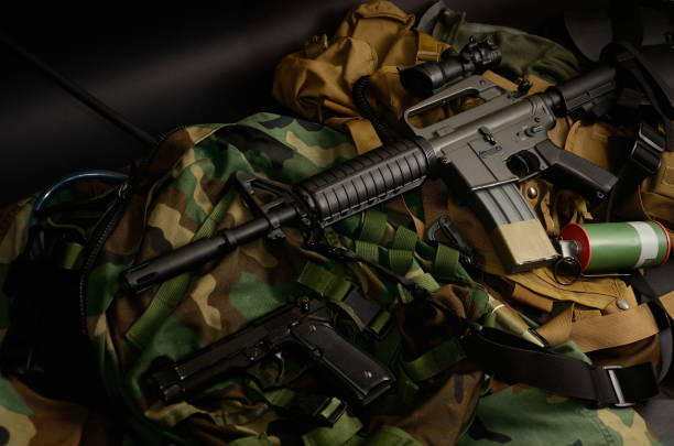 istock Used weapons, pistol, grenade with tactical chest rigs and ammunition. 918254426