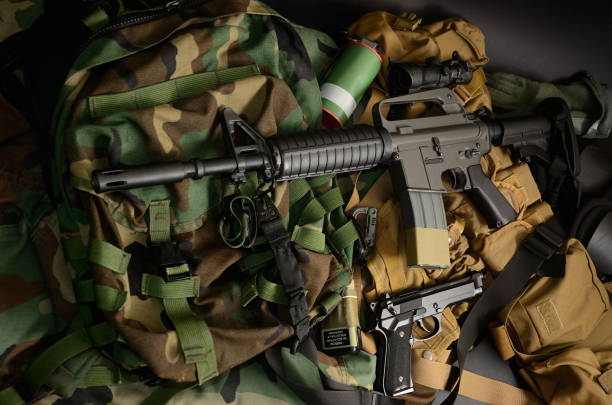 istock Used weapons, pistol, grenade with tactical chest rigs and ammunition. 918254464