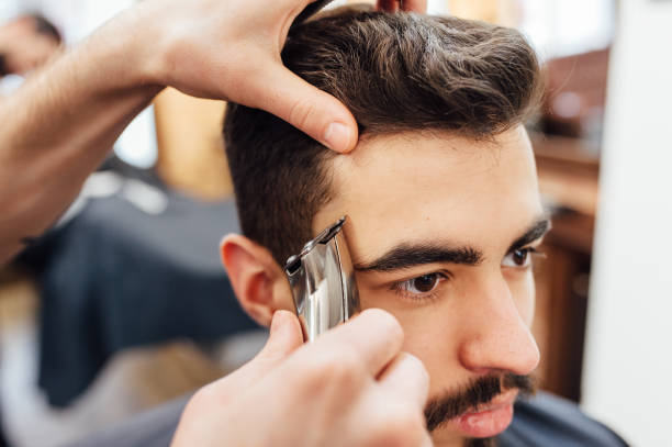 istock Barber shave and modeling beard at the hair salon 918254892