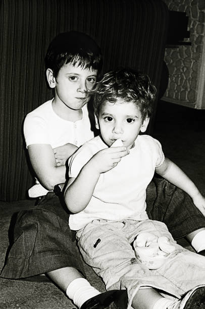 istock Black and white kids eating snacks 918255588
