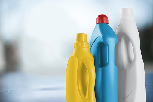 Chemical cleaning supplies on blurred background