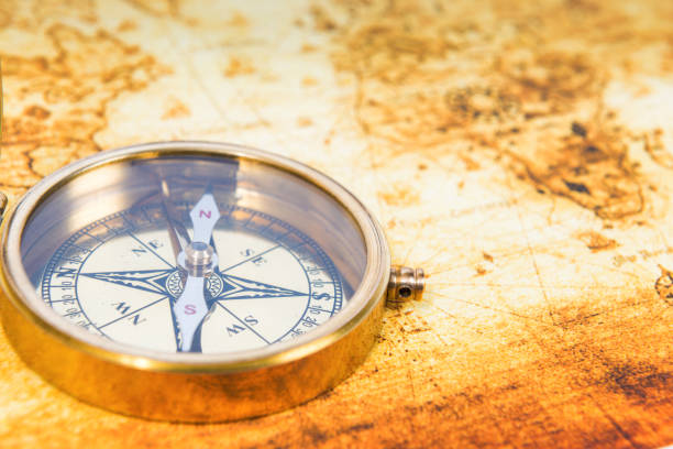 Old map with an ancient compass stock photo