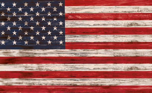 istock United States Flag on Wooden Surface 918259280