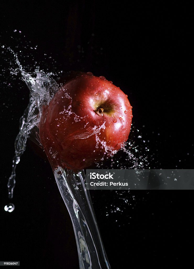 apple e acque spruzzi quattro - Foto stock royalty-free di Mela