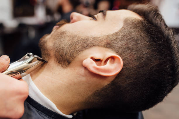 istock Barber shave and modeling beard at the hair salon 918262818