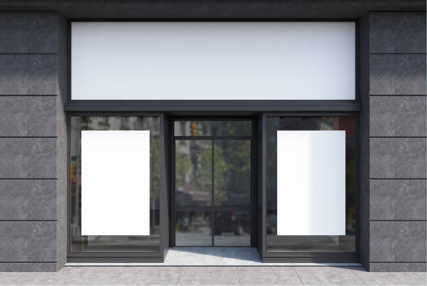 Dark gray and white cafe facade, two posters Glass, white and gray stone cafe facade with two vertical posters and a glass door. 3d rendering mock up facade stock pictures, royalty-free photos & images