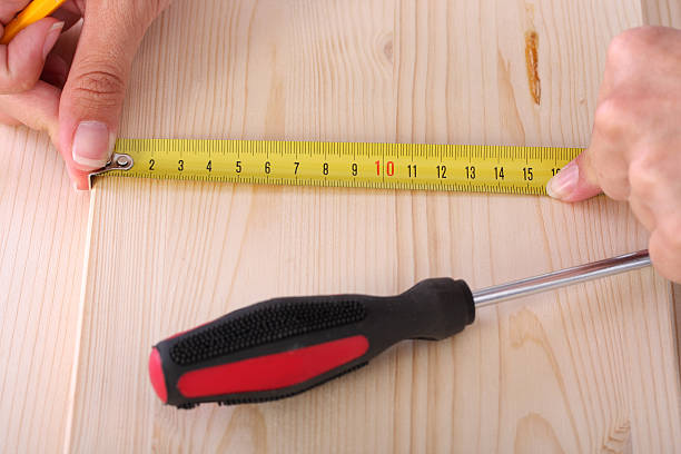 istock wooden plank and measuring tape 91826346