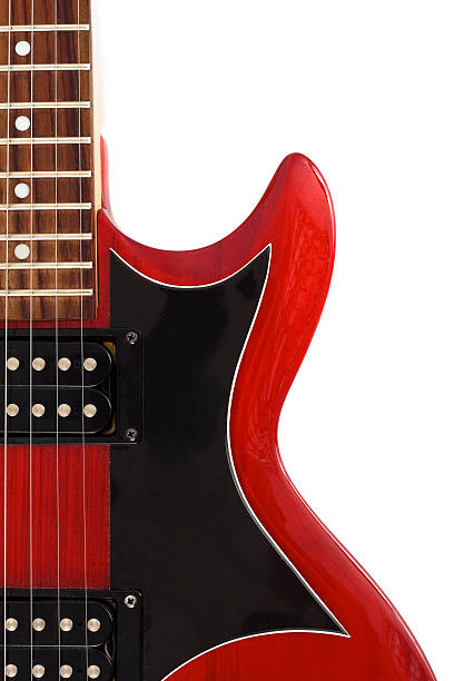 part of red electric guitar isolated on white stock photo