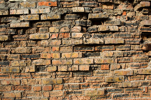 Old weathered  brick wall stock photo