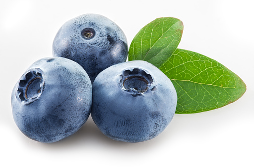 Ripe blueberries on the white background.