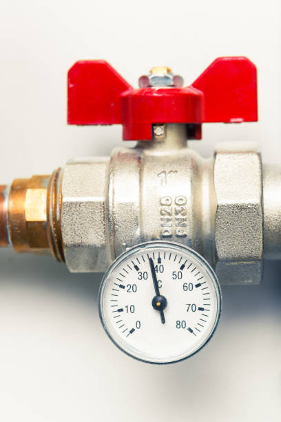 istock temperature gauge indicator with water tap in boiler-room 918267248