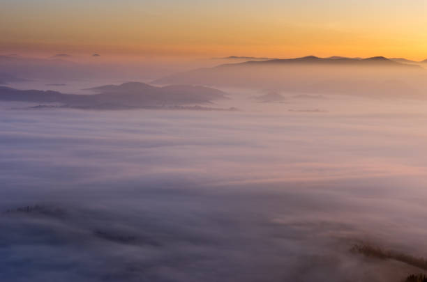 istock A fascinating landscape. Sunrise over the clouds. 918270346