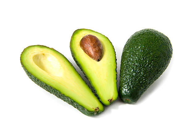 Fresh avocados isolated on white background stock photo