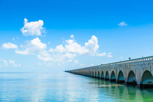 Long Bridge at Florida Key's - Historic Overseas Highway And 7 Mile Bridge to get to Key West, Florida, USA Long Bridge at Florida Key's - Historic Overseas Highway And 7 Mile Bridge to get to Key West - travel destination and highlight of Florida, USA miami marathon stock pictures, royalty-free photos & images