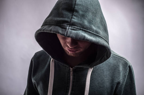 istock young man in hood on white background 918280768