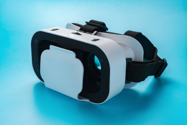 istock side view VR Glasses or Virtual Reality headset on a blue background 918283086
