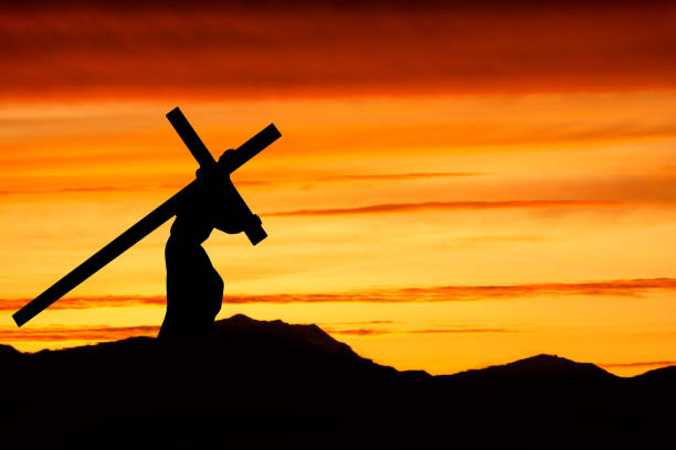 istock Jesus Christ carrying the cross on Good Friday 918283756