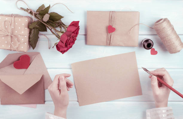 istock Valentine day theme. Top view of workplace for preparing handmade decorations. 918284396