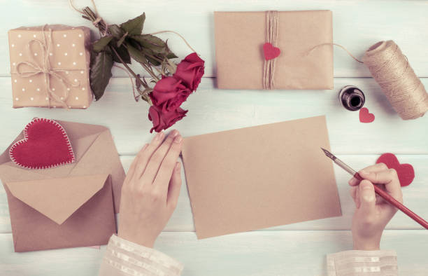istock Valentine day theme. Top view of workplace for preparing handmade decorations. 918284398