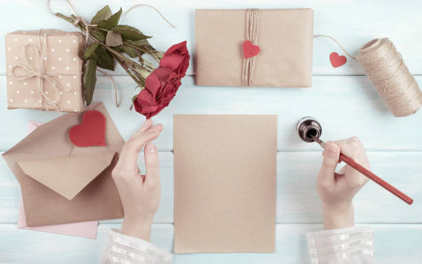 istock Valentine day theme. Top view of workplace for preparing handmade decorations. 918284404