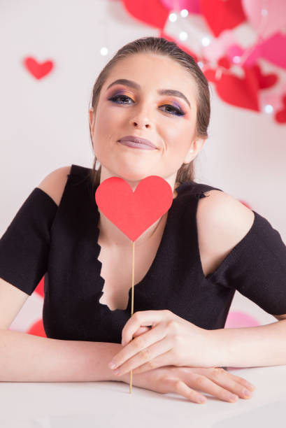 istock Girl with paper heart 918284496