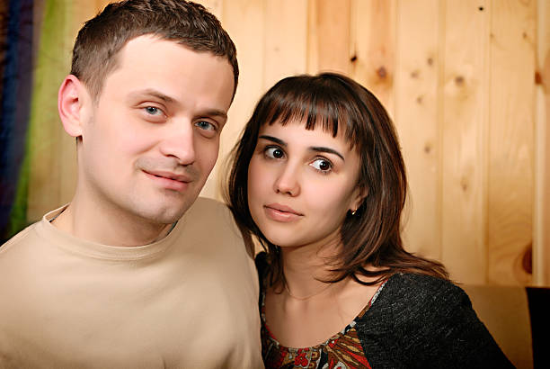 Loving couple close up portrait outdoors