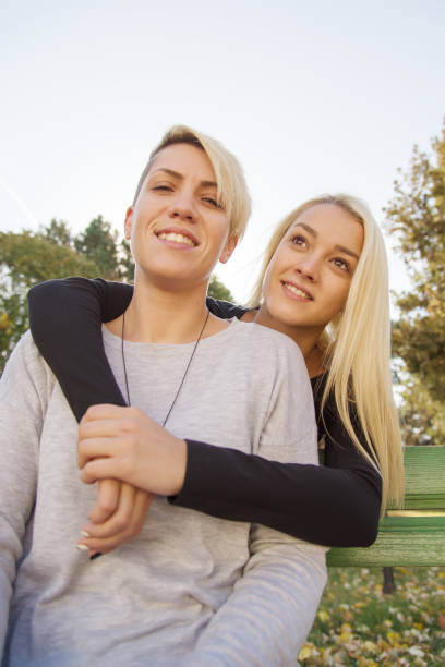 istock Two girlfriends in the park. 918289586