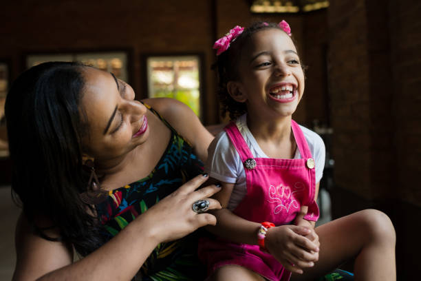 istock Mother and daughter having fun at home 918290832