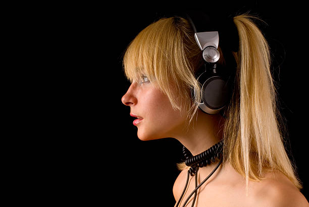 istock Young girl with headphones 91829190