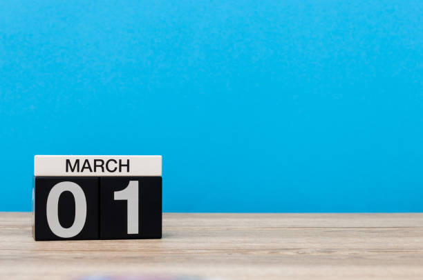 istock March 1st. Day 1 of march month, calendar on light blue background. Spring time, empty space for text, mockup 918293544