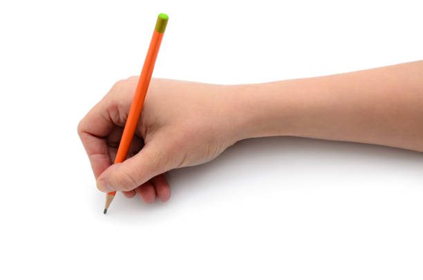 istock Hand draws with a pencil on white paper 918294964