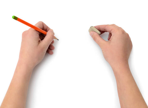 istock Hand draws with a pencil on white paper 918294982