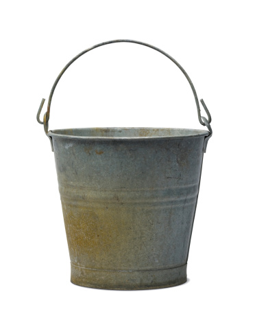 An antique grunge zinc metal bucket isolated over white with tight clipping path. Canon 5D MarkII