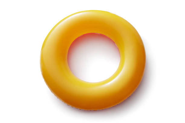 sport: anello gonfiabile arancione isolato su sfondo bianco - lifeguard swimming pool summer swimming foto e immagini stock