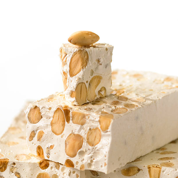Spanish Christmas sweets turron on the bokeh lights background