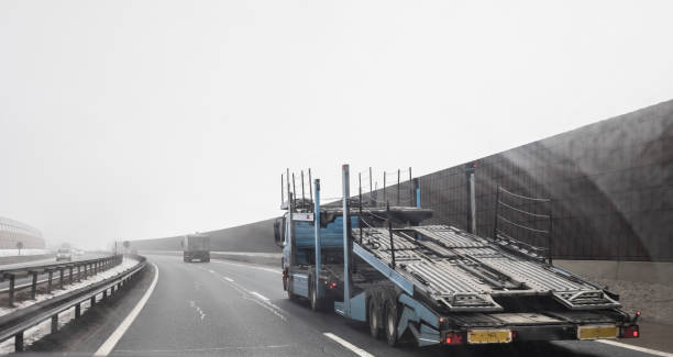 istock Empty Car Transportation Truck on Highway in Winter 918311358
