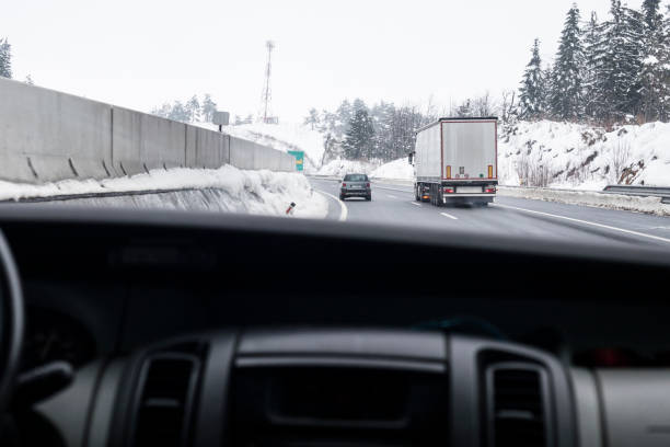 istock Semi-truck Transportation on Highway in Winter 918311360