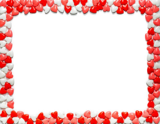 Heart shaped sweet Valentine's Day candy framing letter size white paper